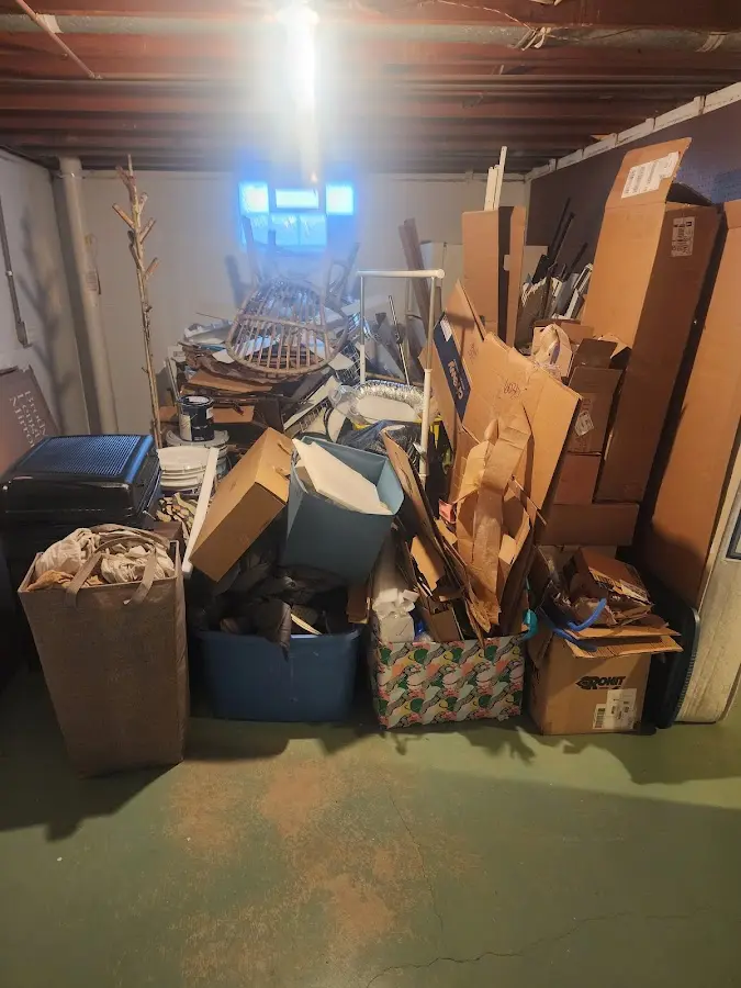 Roll-off dumpster container at job site for 2 Yard Dumpster Rental in Whitney